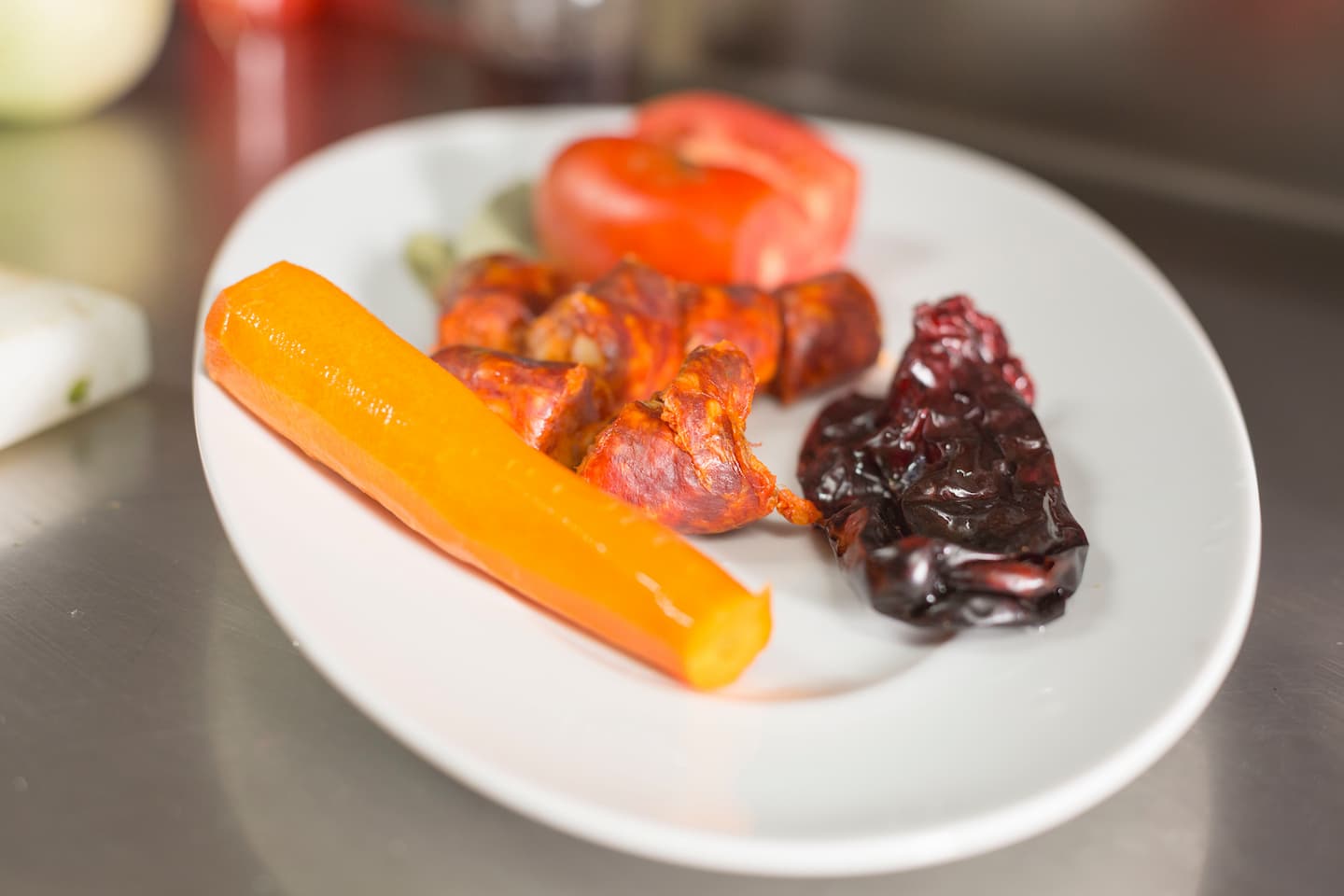 Zanahoria, chorizo, pimiento y tomate